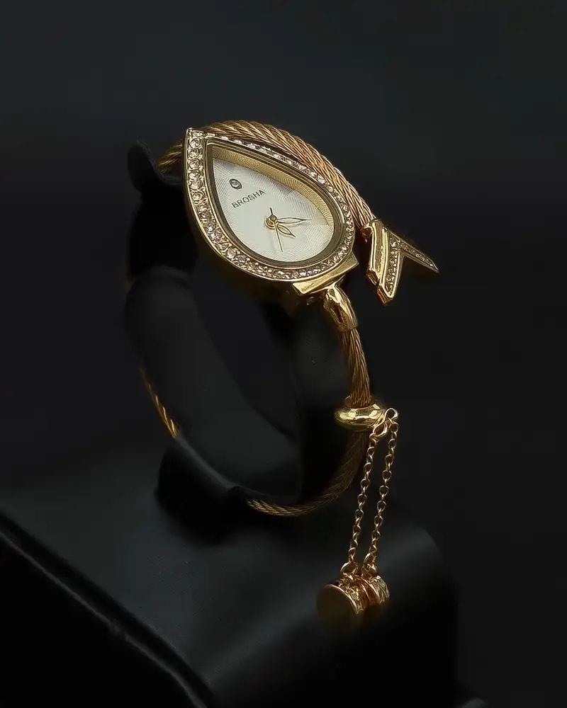 Teardrop-shaped wristwatch adorned with sparkling crystals