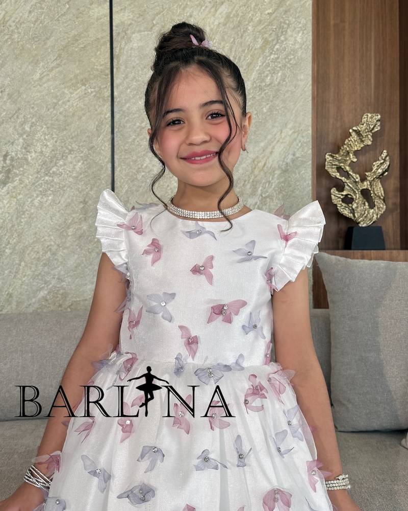 Girls' white dress with soft colorful butterflies
