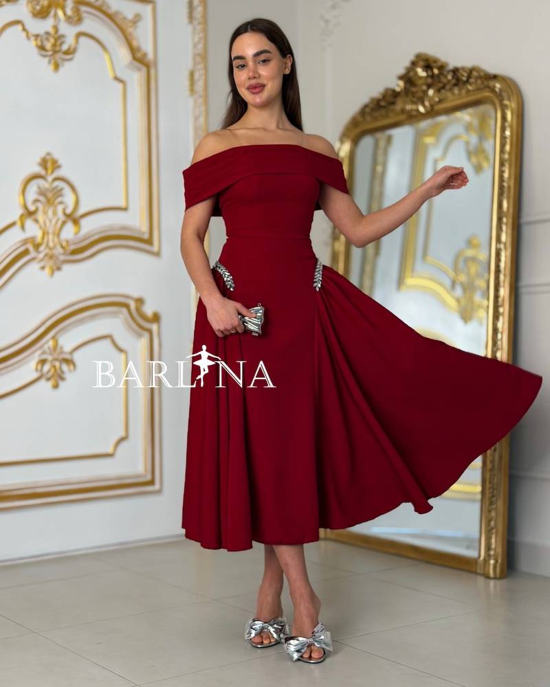 Burgundy off-shoulder dress with a feminine cut