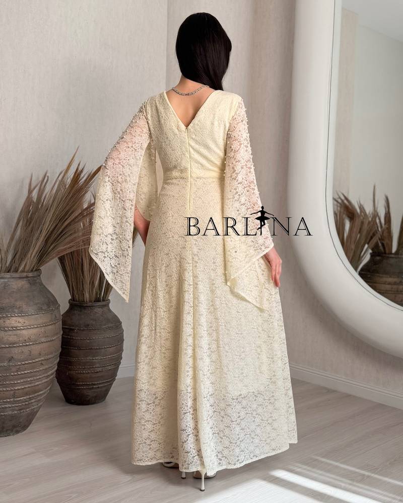 Beige lace dress with delicate pearl embroidery