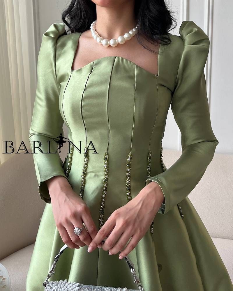 Royal green long dress with classic cut