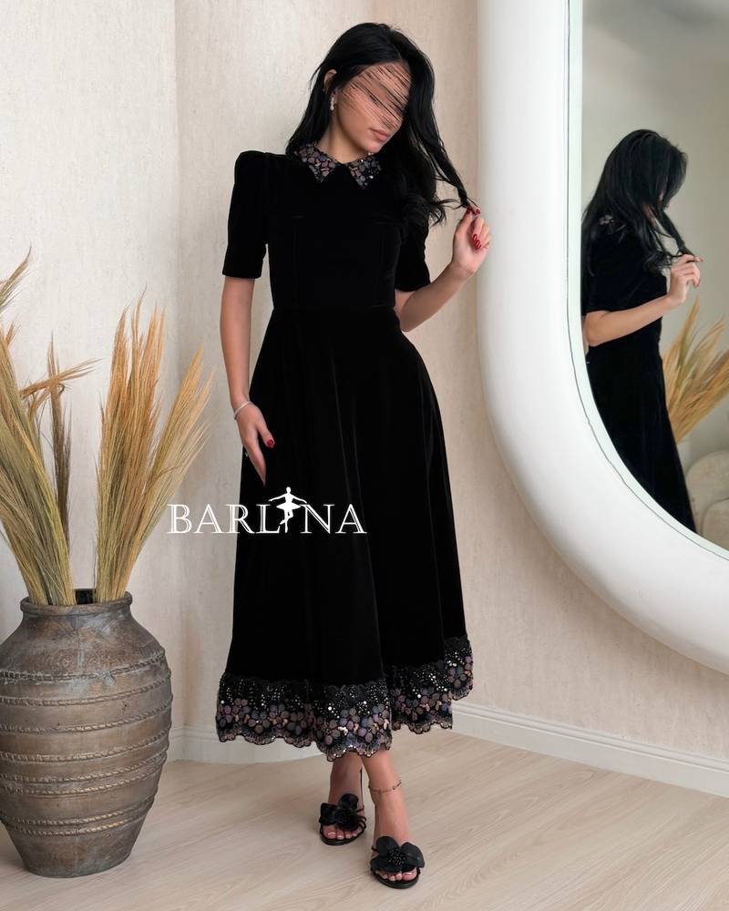 Black velvet dress with mid-length sleeves