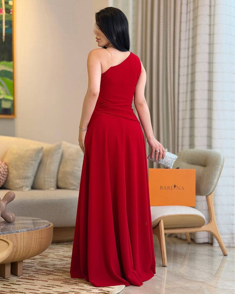 Elegant red one-shoulder dress with a defined waist