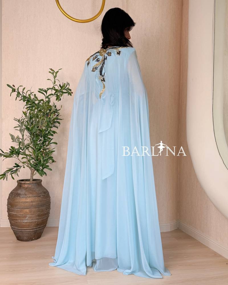 Sky blue jalabiya with a collar decorated with beadwork