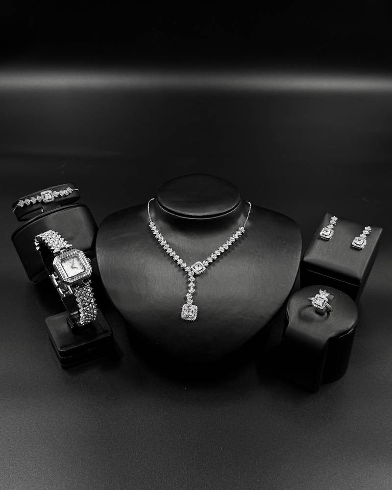 Accessory set with delicate pendants studded with stones