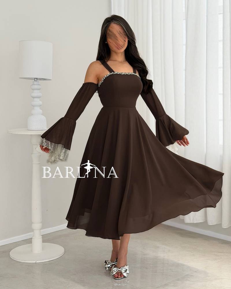 Brown dress with wide sleeves decorated with lace