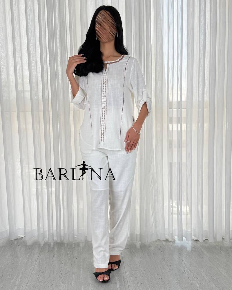 Soft white set embroidered with brown threads