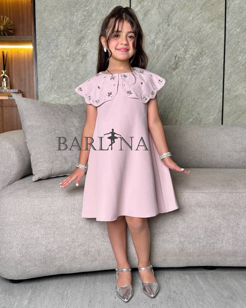 Girls' dress with a floral collar