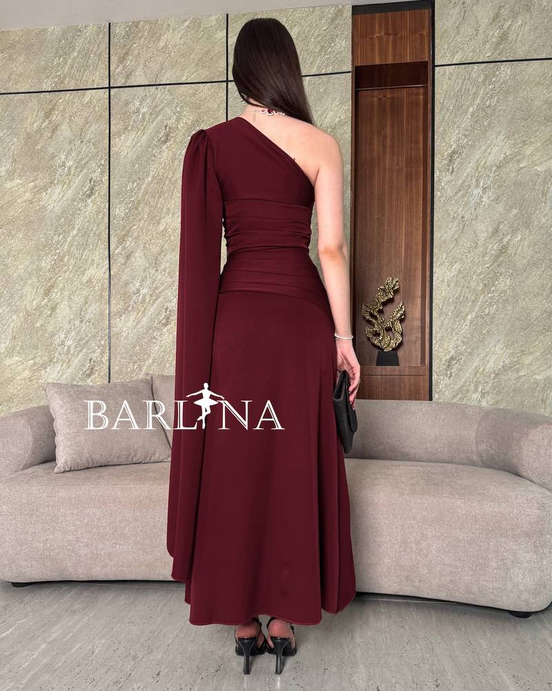 Burgundy one-shoulder dress with soft pleats