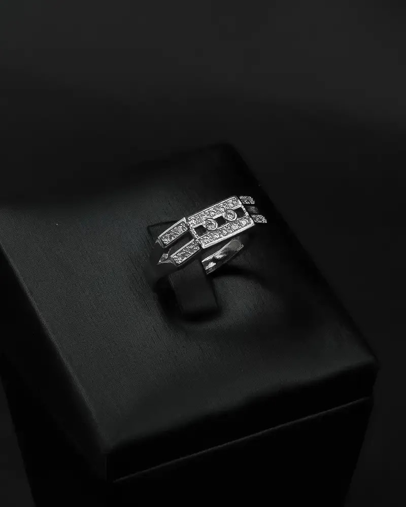 A delicate bracelet and ring with geometric, studded lines