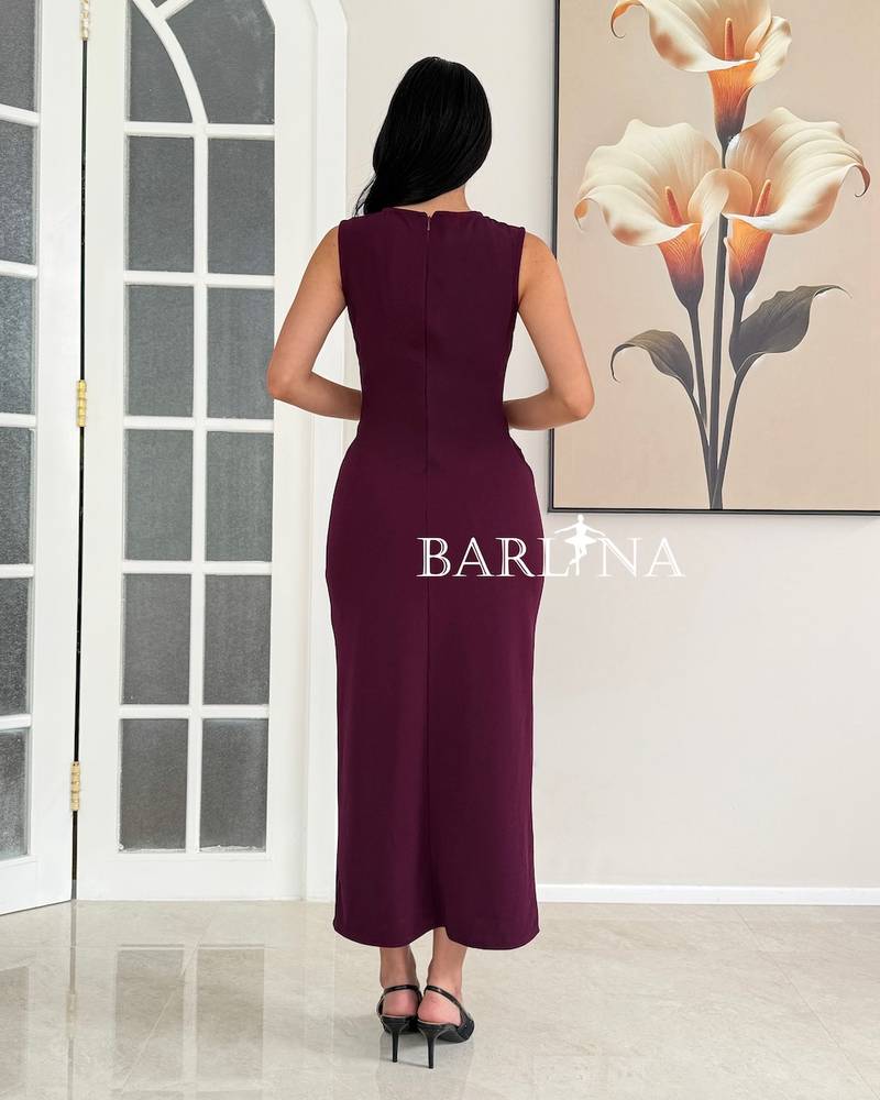 A soft berry-colored dress with a straight cut