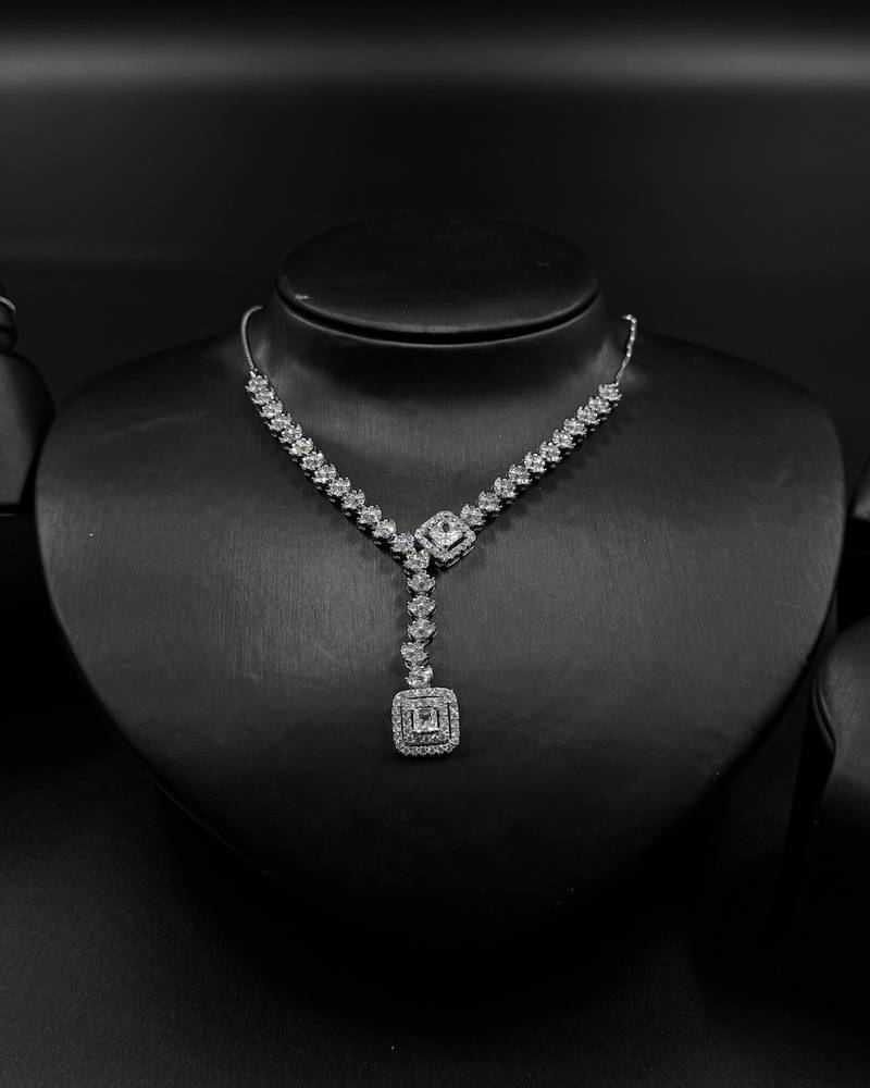 Accessory set with delicate pendants studded with stones