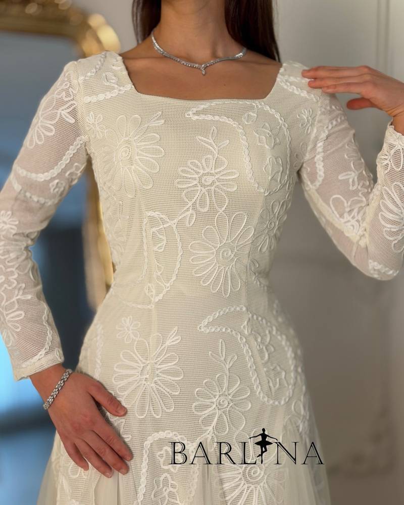 Soft white tulle dress with lace embroidery