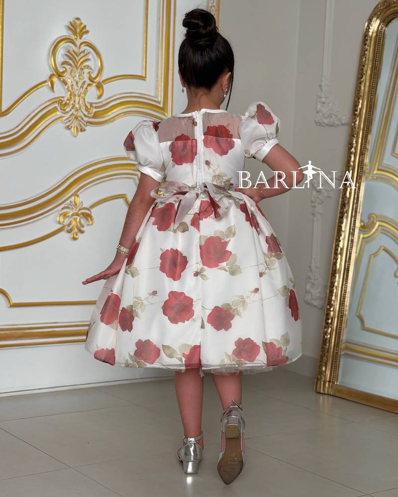 White girl's dress with red floral prints