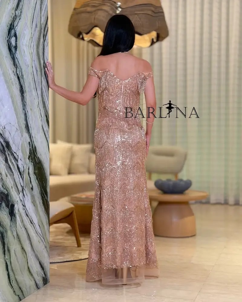 Shimmering off-shoulder evening dress with beaded fringe