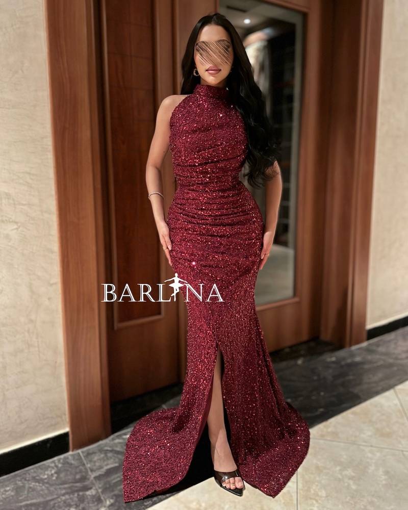 Luxurious burgundy dress covered in shiny sequins