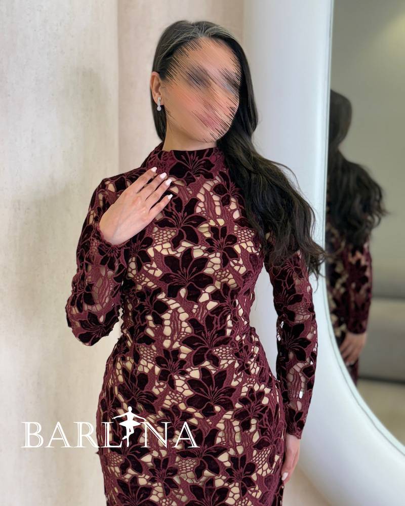 Burgundy dress with long sleeves and lace pattern