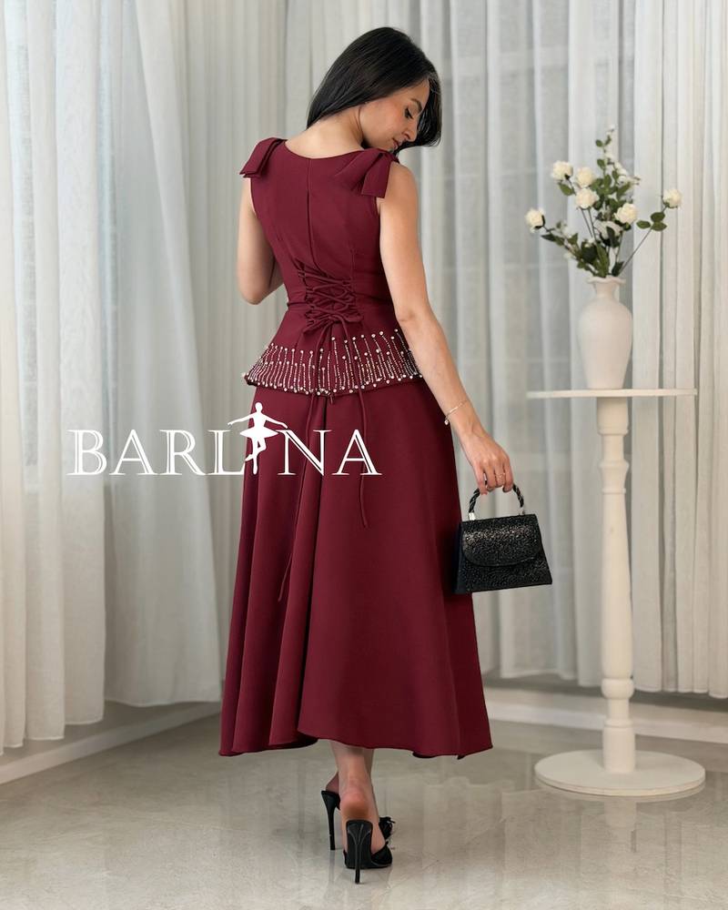 Two-piece burgundy set decorated with rhinestones