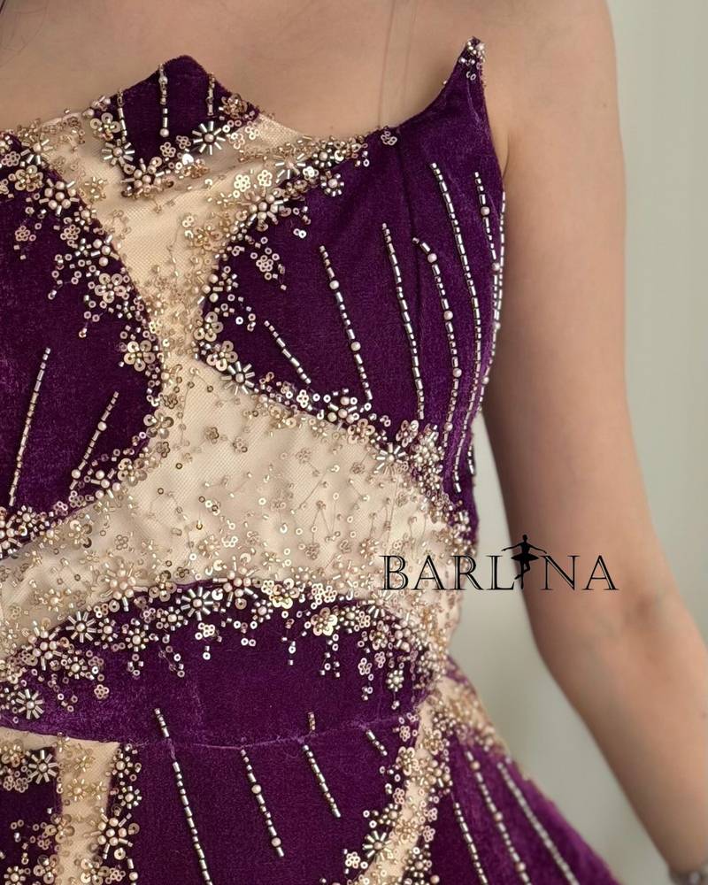 Beige evening dress with shimmering purple embroidery