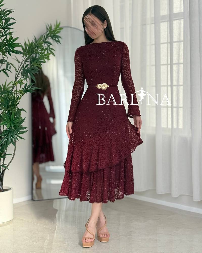 Feminine burgundy lace dress with a gold belt