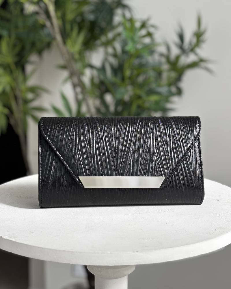 Clutch bag with a soft stripe pattern
