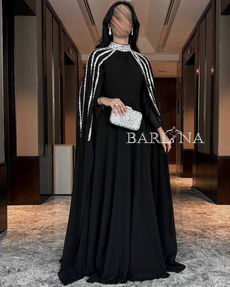 Long black chiffon cape dress decorated with sequins