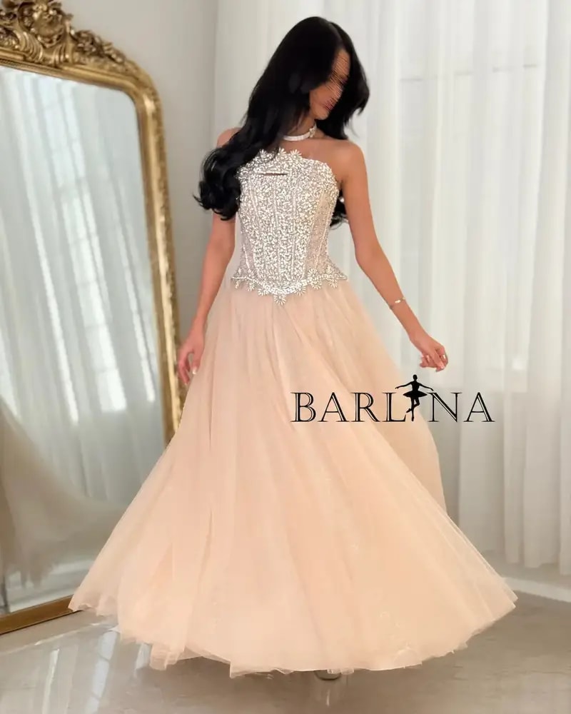Beige evening dress with embroidered corset
