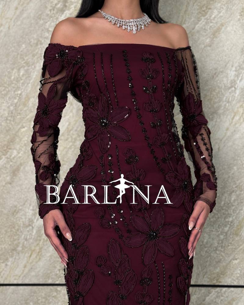 Burgundy dress with full embroidery and rose designs