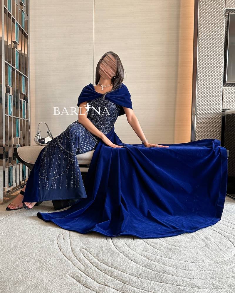 Blue evening dress with shiny details