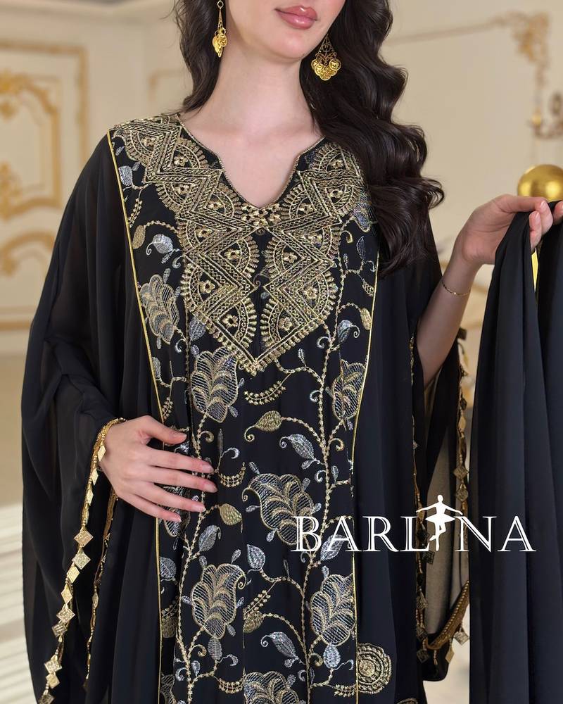 Luxurious jalabiya with gold embroidery and a shawl