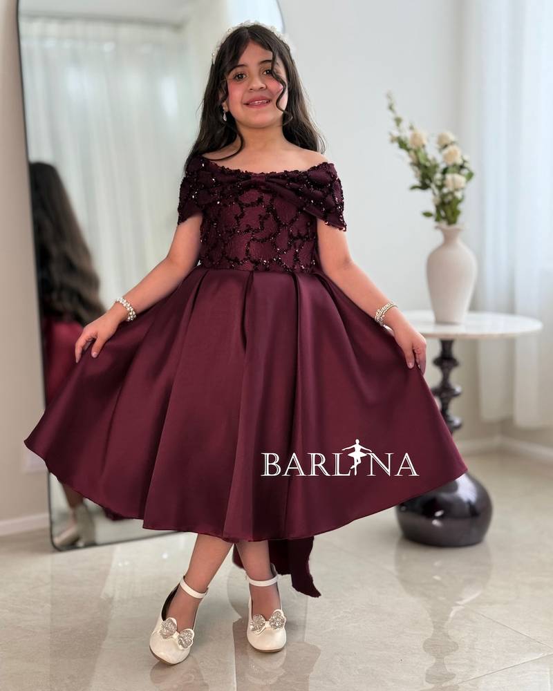 Girls' burgundy evening dress with a wide cut