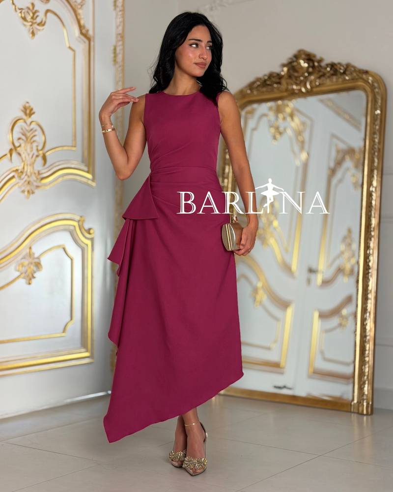 Fuchsia midi dress with an asymmetrical cut