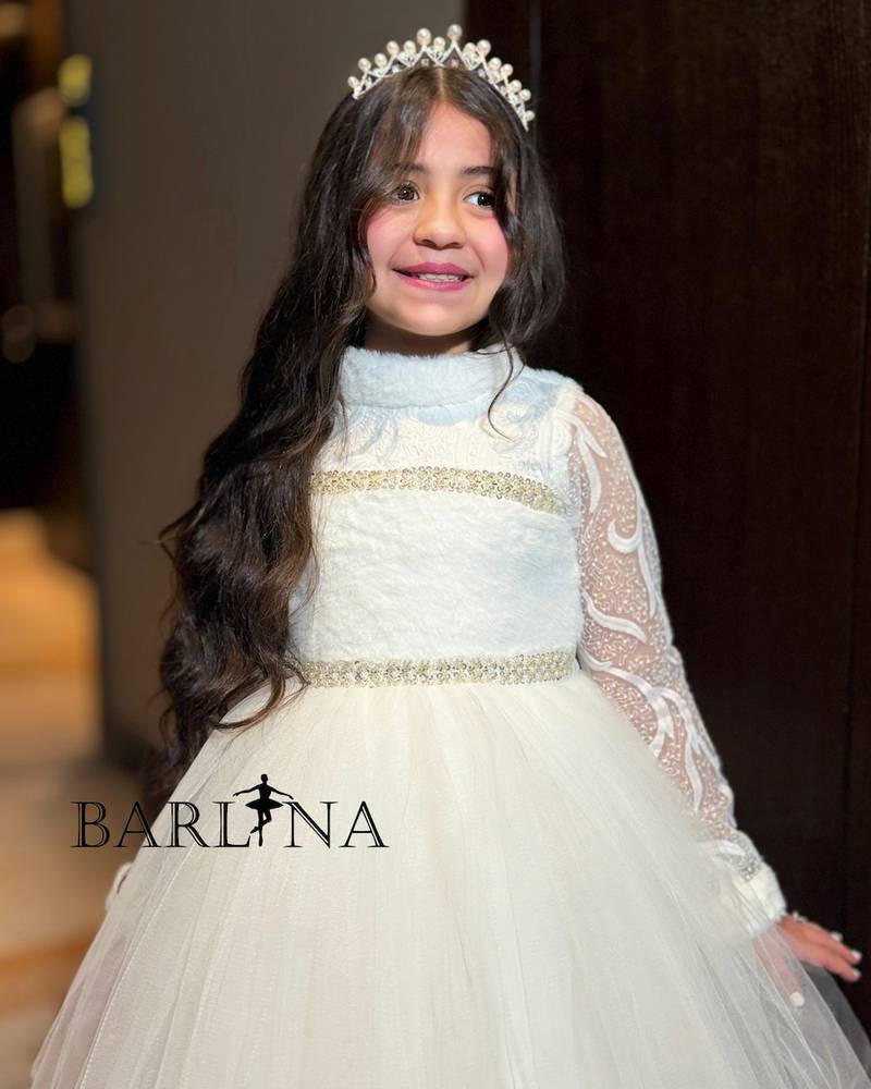 White girl's dress with a high neck and fluffy tulle