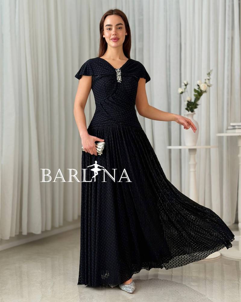 Long black dress with elegant crystal detailing