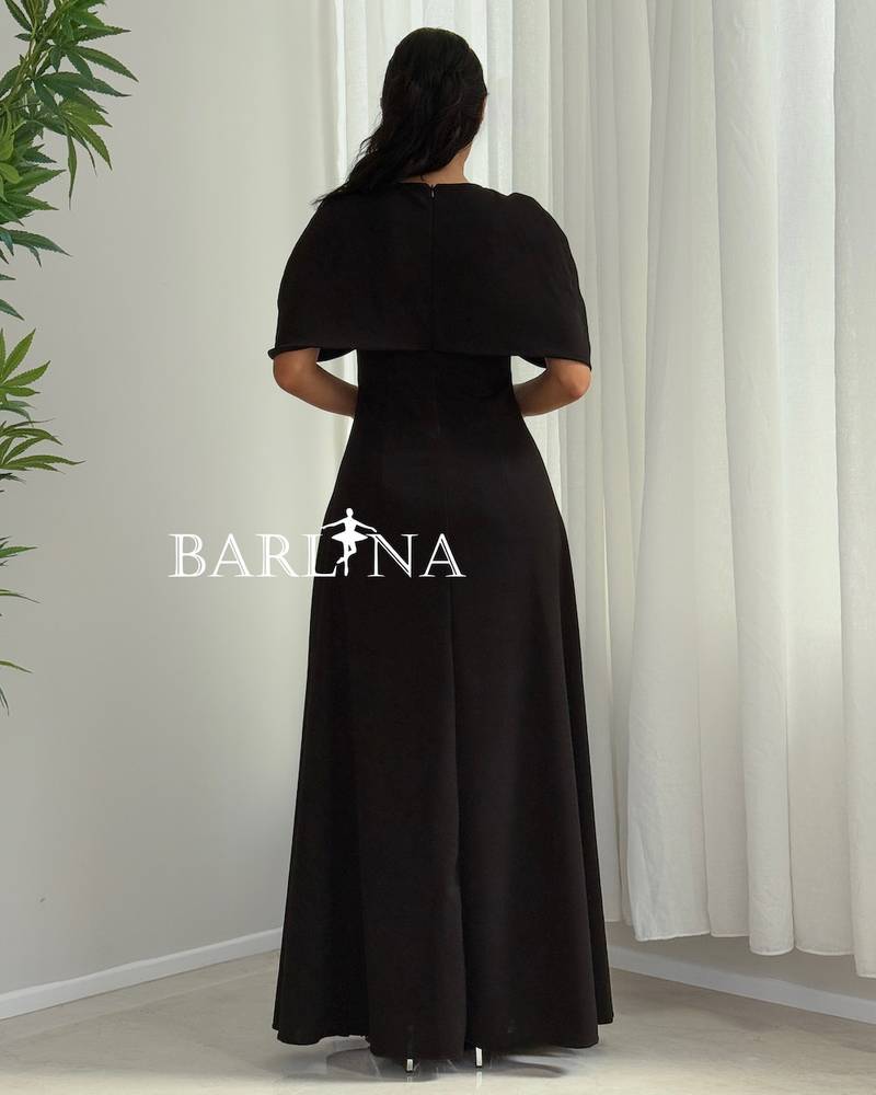 A soft black dress with crystal detailing