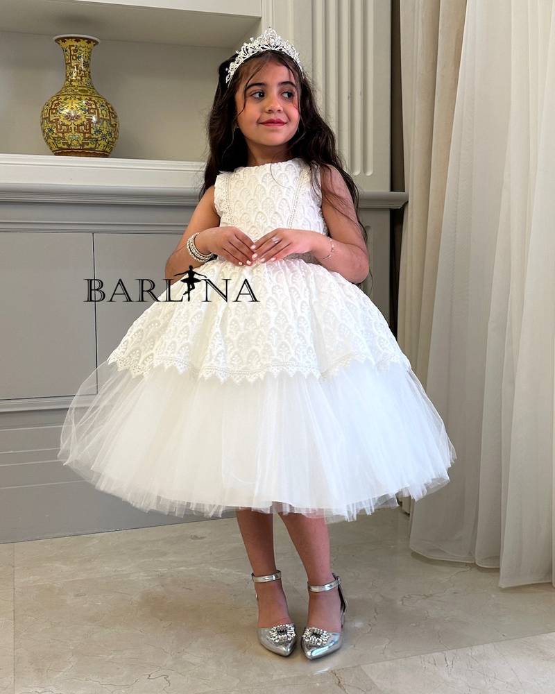 Girls white dress with lace patterns
