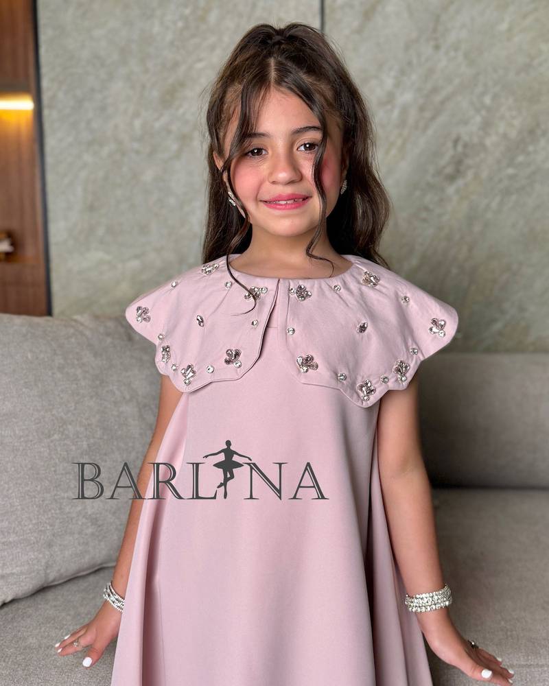 Girls' dress with a floral collar