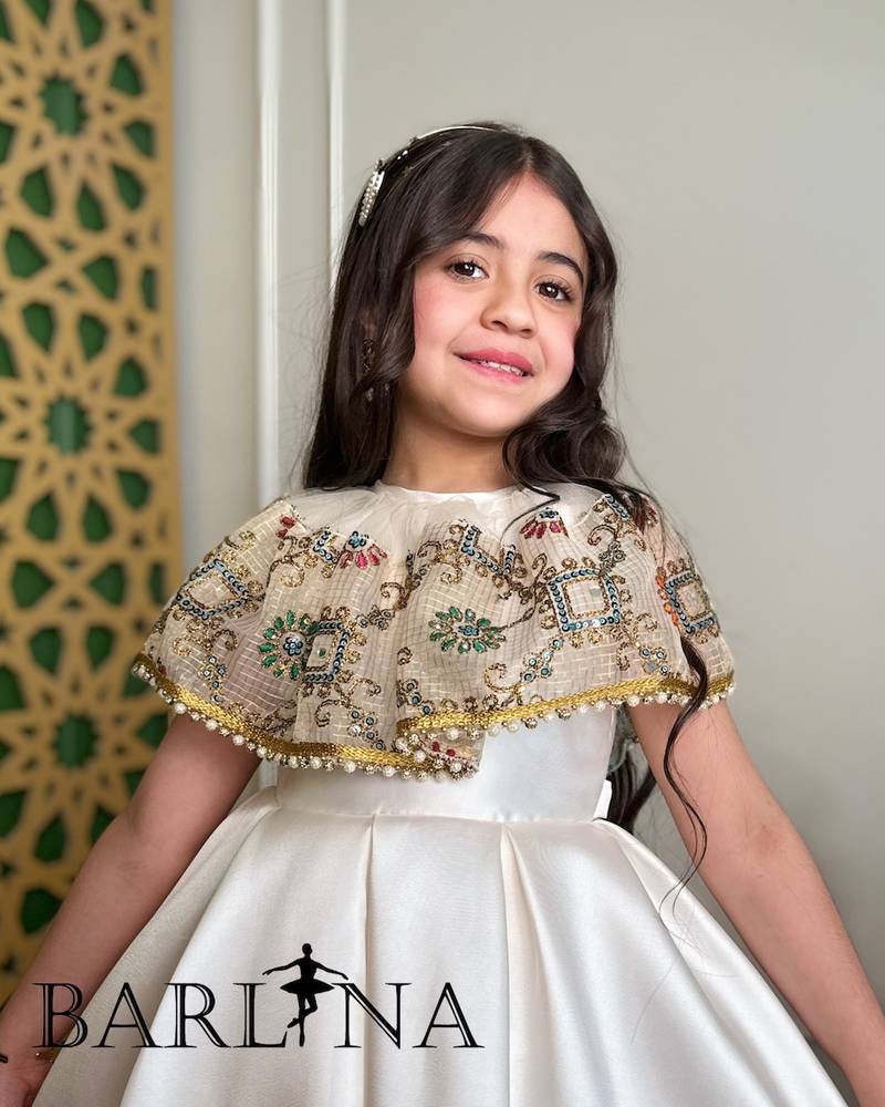 Off-white girls' dress with embroidered cape