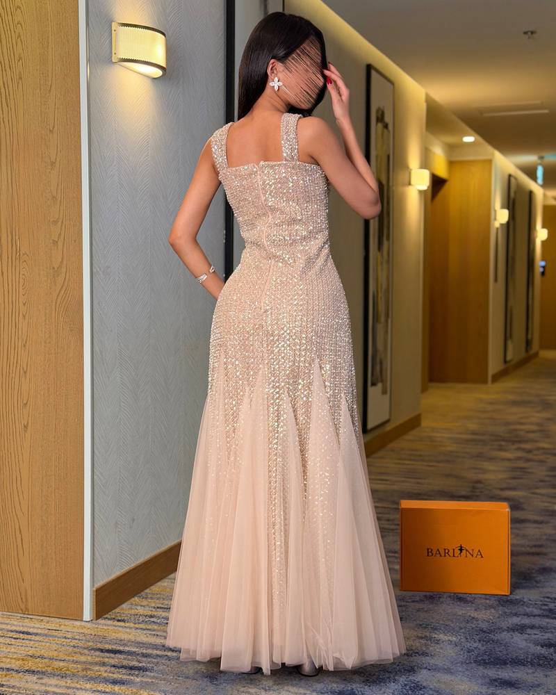 فستان سهرة فاخر مطرز بالترتر اللامع
