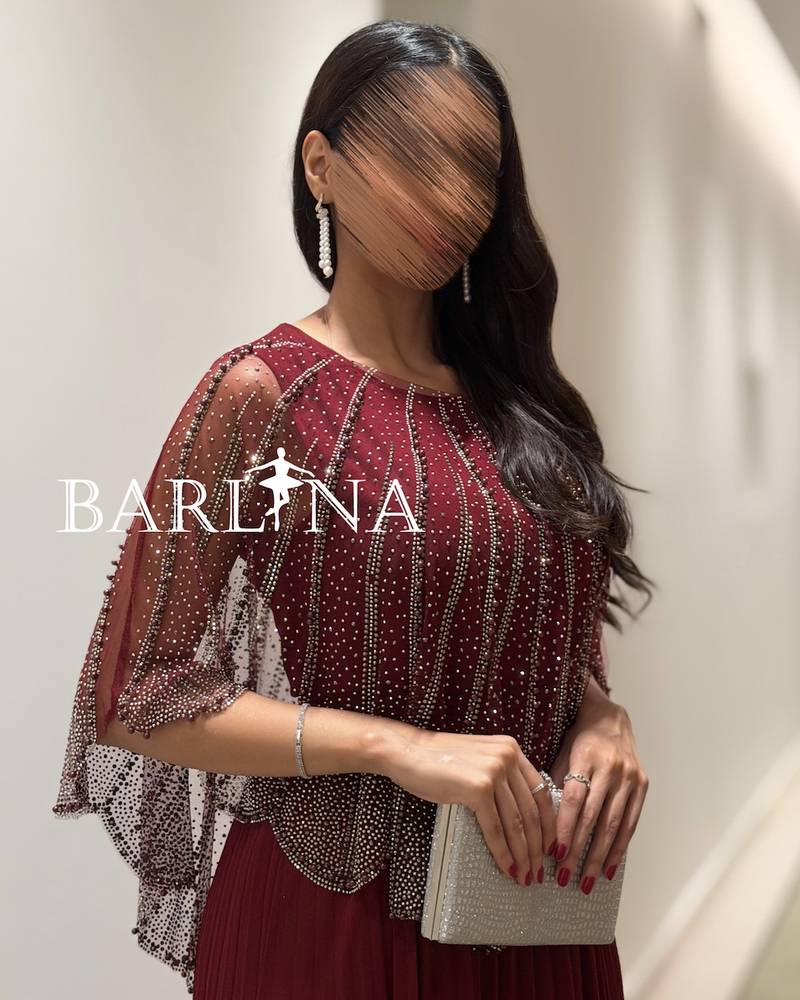 Loose burgundy dress with a beaded layer