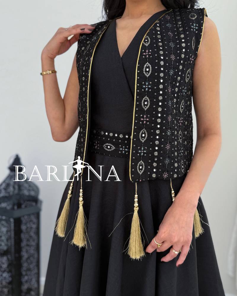 Navy blue jalabiya with an embroidered vest