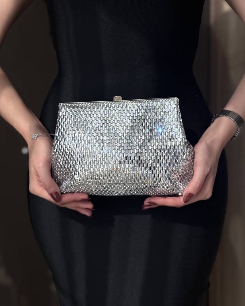 Handbag with elegant mesh details