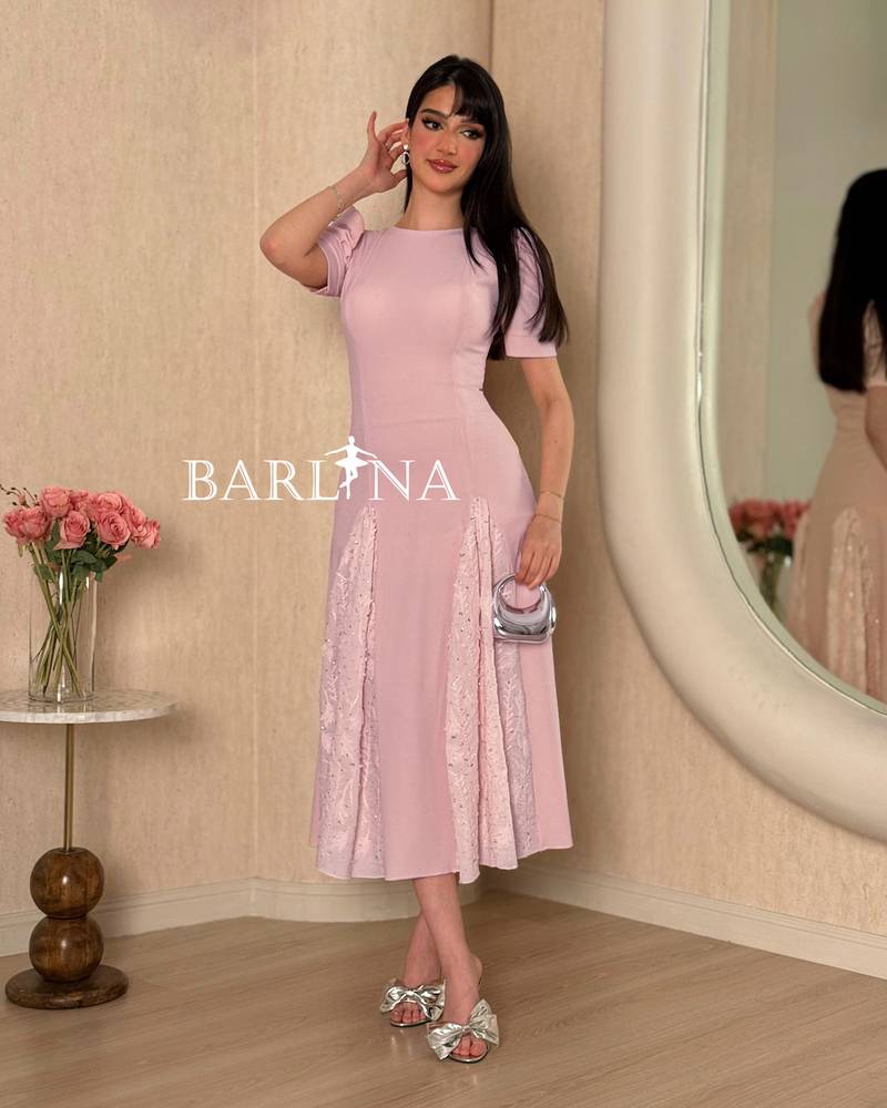 Pink midi dress with a soft  feminine cut
