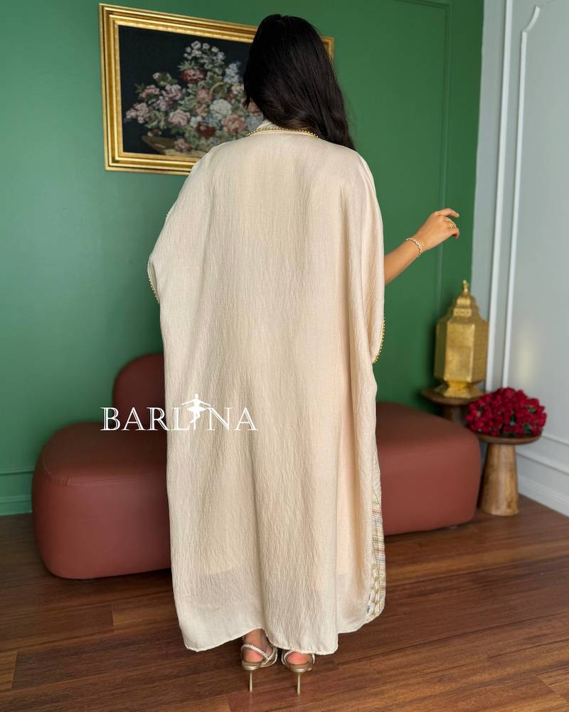 Beige jalabiya with colorful circular embroidery