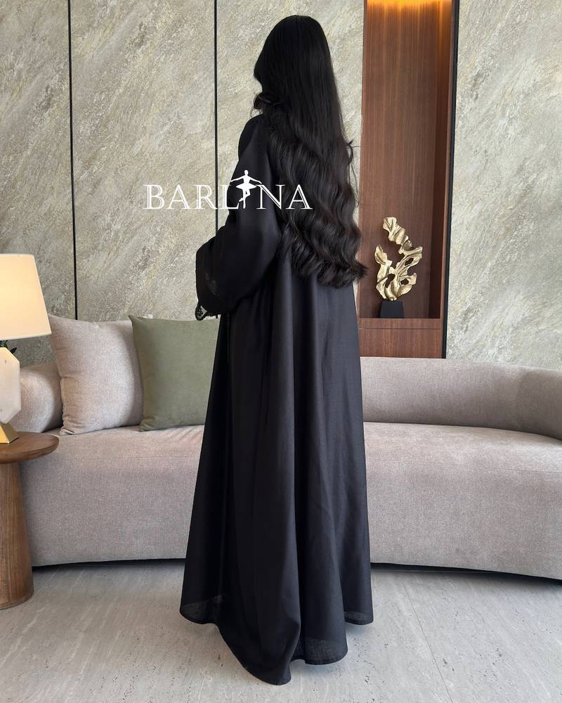 Black abaya with sleeves decorated with shiny embroidery