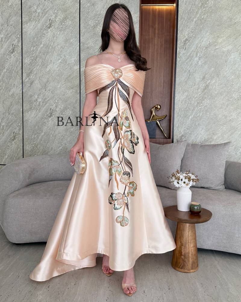 Beige evening dress with hanging floral embroidery