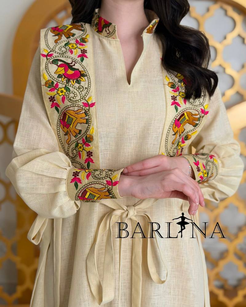 Beige jalabiya with colorful embroidery and a waist belt