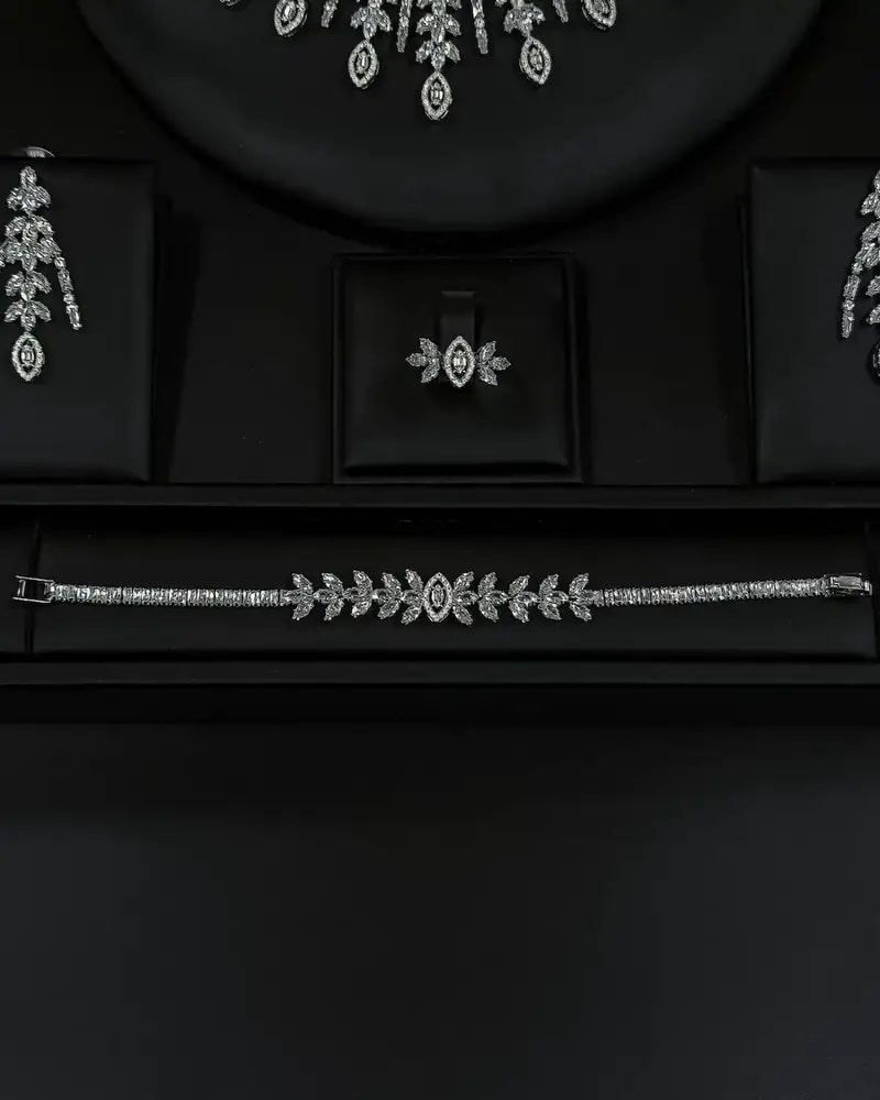 Crystal-studded accessory set with a dangling design
