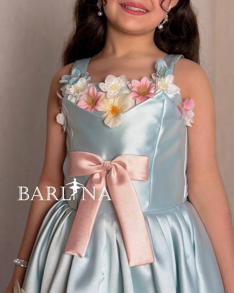 Sky blue girl's dress decorated with colorful roses