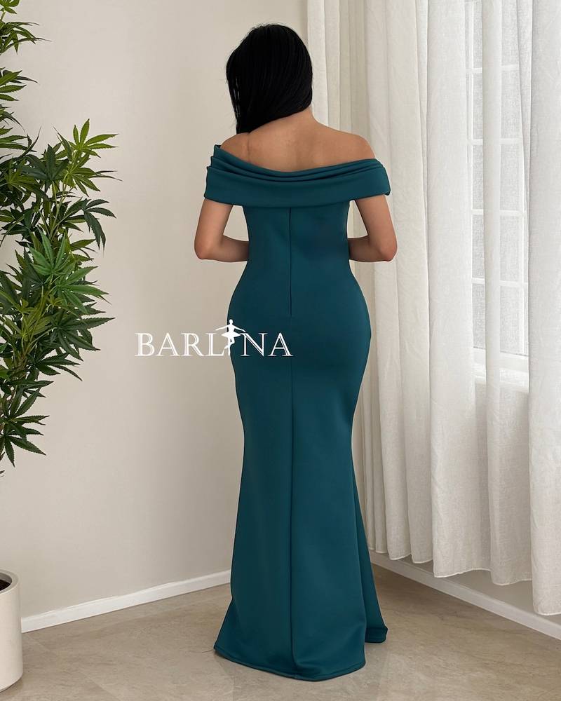 Petrol green dress with shoulder pleats